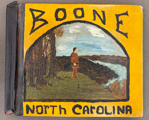 Illustrated cover of a handmade student history book about Boone.
