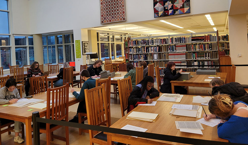 Students examining archival materials in the reading room