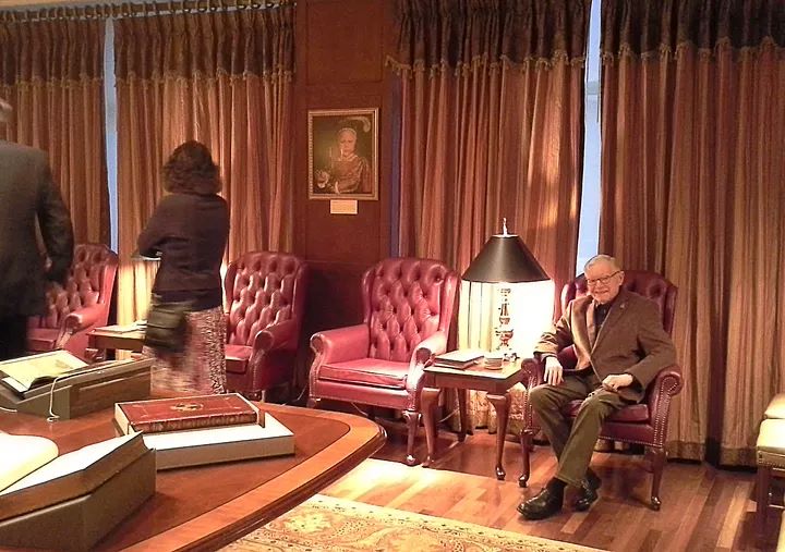 Bill Rhinehart during the rare books open house in the Rhinehart Room.