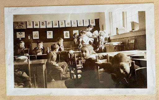 Group photograph of Watauga County schoolchildren seated in a classroom, from the 1940-'41 town of Boone book