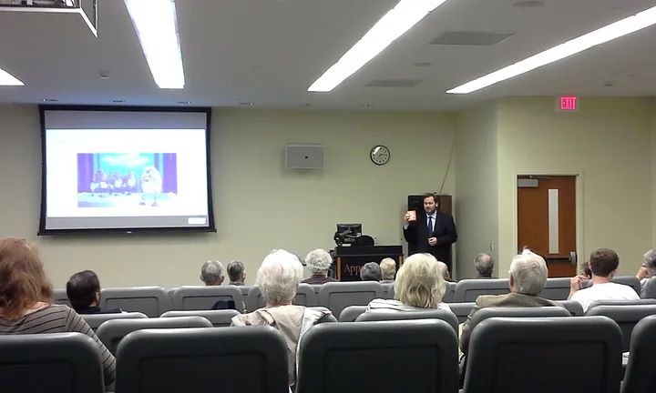 Dr. Jason White starts his lecture with a reference to currents…and California Raisins.