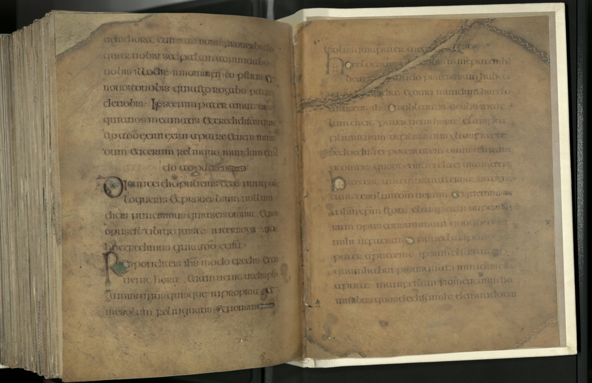 Two sample facsimile pages, capturing repairs to the original Book