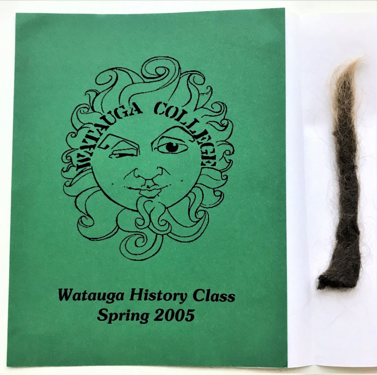 Cover of Spring 2005 Watauga College scrapbook, with dreadlock