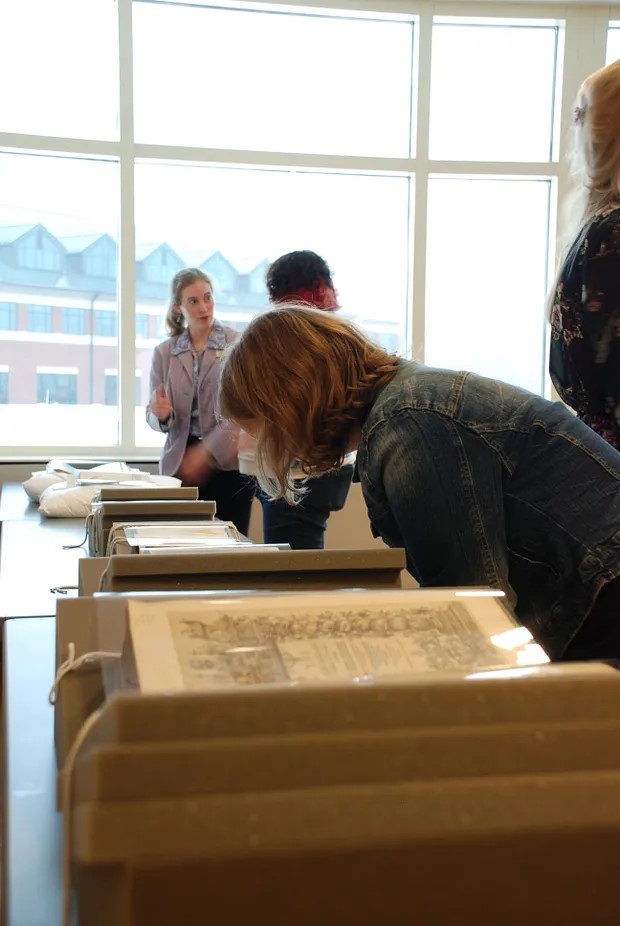 Greta Browning describes a book printing process to an audience member