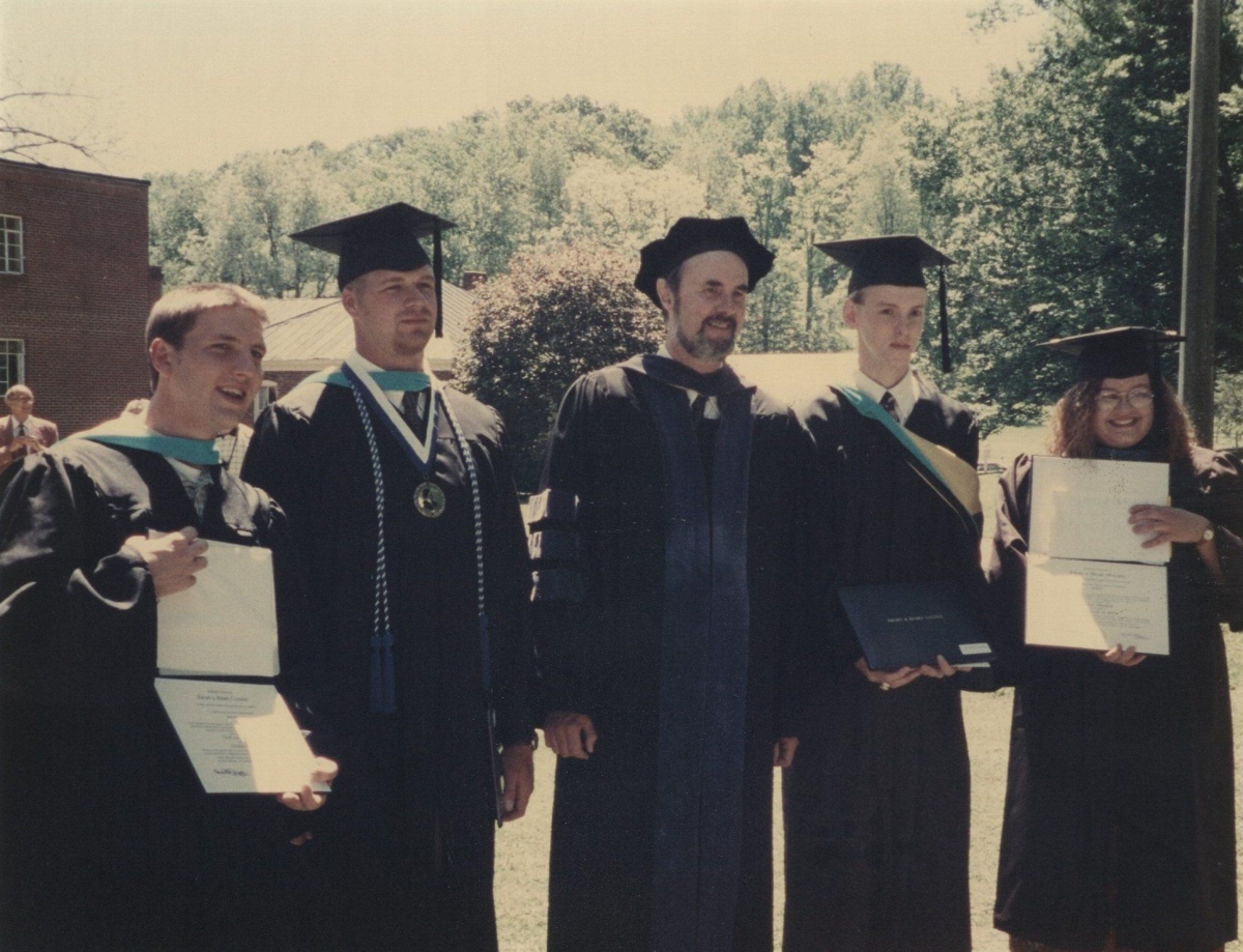 Dr. Stephen Fisher (center) with graduating students from the first class of the Public Policy and Community Service program. Emory & Henry University