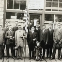 The Colored Department of Norfolk and Western Railroad Y.M.C.A. photograph, AC 266, depicts 15 African Americans standing in front of a building with a sign reading