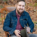 Trevor McKenzie sitting in a rocking chair