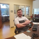 Image of Nathan Rodney sitting at the SCRC desk