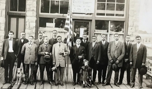 The Colored Department of Norfolk and Western Railroad Y.M.C.A. photograph, AC 266, depicts 15 African Americans standing in front of a building with a sign reading 